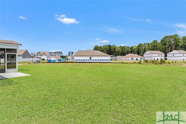 98 Westbourne Way, Savannah, GA 31407 - view of yard featuring a residential view and a sunroom