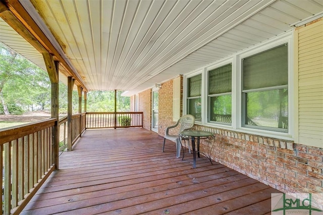 wooden terrace with covered porch