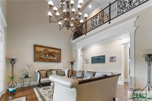 3 Cobham Draw Draw, Pooler, GA 31322 - living area with a high ceiling, wood finished floors, baseboards, and ornate columns