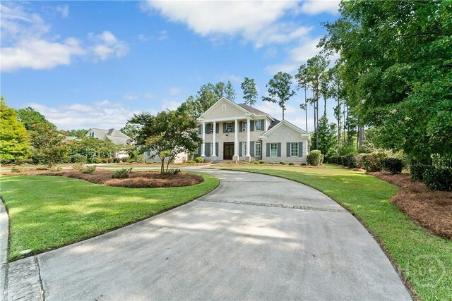 3 Cobham Draw Draw, Pooler, GA 31322 - neoclassical home with a front yard and curved driveway