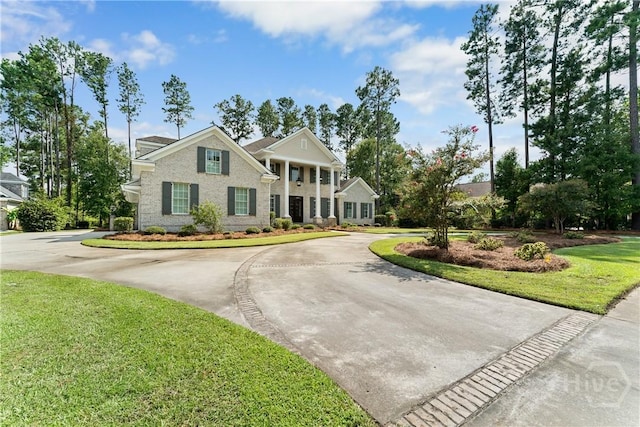 3 Cobham Draw Draw, Pooler, GA 31322 - greek revival inspired property with curved driveway and a front lawn