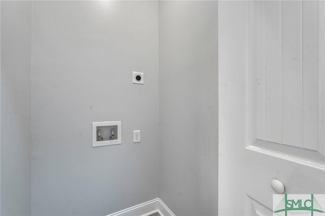 laundry area with washer hookup, hookup for an electric dryer, laundry area, and baseboards