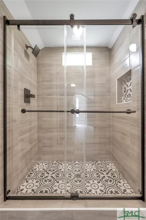 bathroom featuring a stall shower