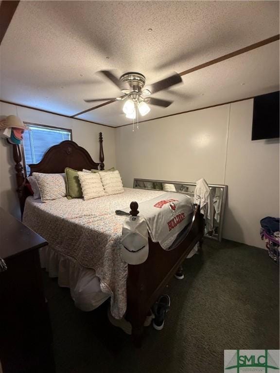carpeted bedroom featuring a ceiling fan and a textured ceiling