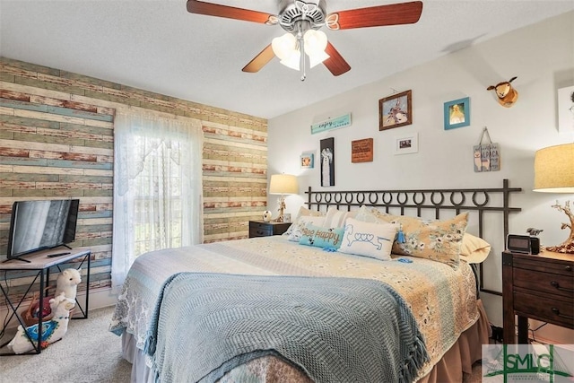 219 N College St, Pembroke, GA 31321 - bedroom featuring ceiling fan and carpet