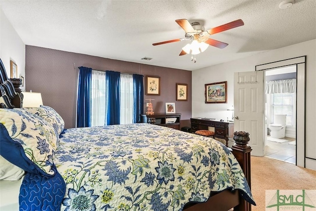 219 N College St, Pembroke, GA 31321 - carpeted bedroom featuring a textured ceiling, ceiling fan, and visible vents