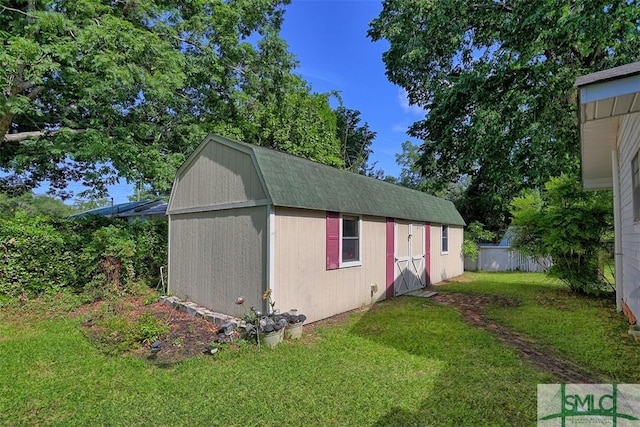 219 N College St, Pembroke, GA 31321 - view of shed featuring fence