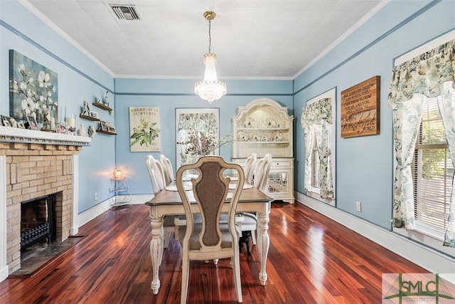 219 N College St, Pembroke, GA 31321 - dining area featuring visible vents, crown molding, and wood finished floors