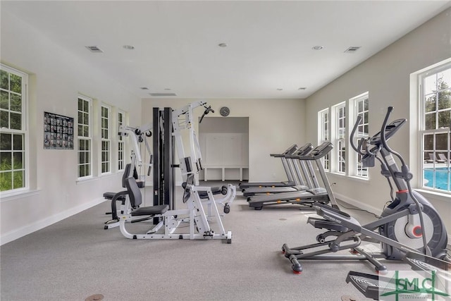 workout area with baseboards and visible vents
