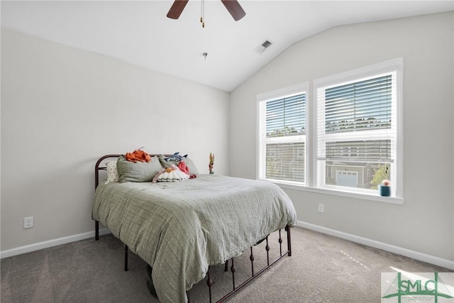 carpeted bedroom with baseboards, visible vents, and lofted ceiling
