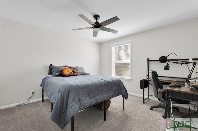 bedroom featuring baseboards, ceiling fan, and carpet