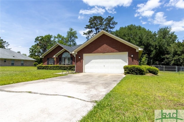 ranch-style house featuring a front lawn, fence, brick siding, concrete driveway, and an attached garage