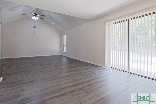 unfurnished living room with baseboards, plenty of natural light, ceiling fan, and wood finished floors