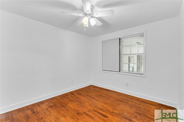 819 W 51st St, Savannah, GA 31405 - unfurnished room featuring baseboards, wood finished floors, and a ceiling fan