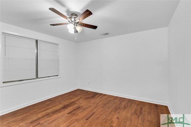 819 W 51st St, Savannah, GA 31405 - spare room with baseboards, wood finished floors, and a ceiling fan