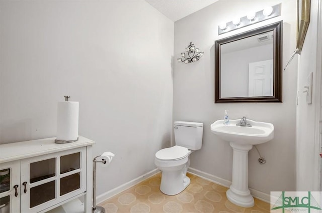 2504 Quacco Rd, Pooler, GA 31322 - half bath with baseboards and toilet