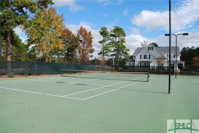 2504 Quacco Rd, Pooler, GA 31322 - view of tennis court with fence and community basketball court
