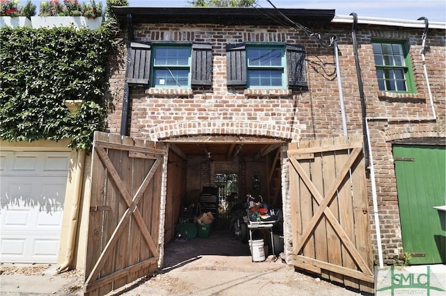 view of front of house featuring brick siding