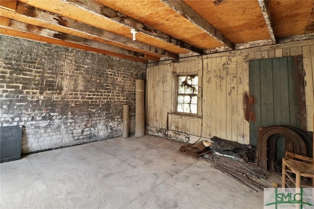 interior space featuring unfinished concrete floors