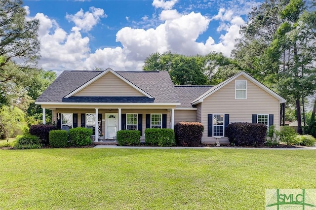 213 Rosehill Dr E, Rincon, GA 31326 - view of front of home with a front yard, roof with shingles, and covered porch