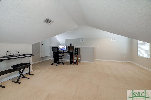213 Rosehill Dr E, Rincon, GA 31326 - office area featuring vaulted ceiling, a textured ceiling, carpet flooring, and visible vents
