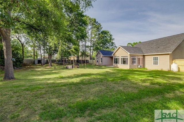 213 Rosehill Dr E, Rincon, GA 31326 - view of yard with fence