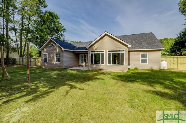 213 Rosehill Dr E, Rincon, GA 31326 - rear view of property with a yard and a fenced backyard