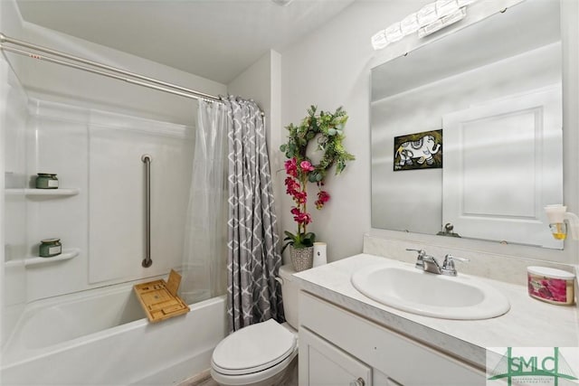 full bathroom with vanity, toilet, and shower / tub combo