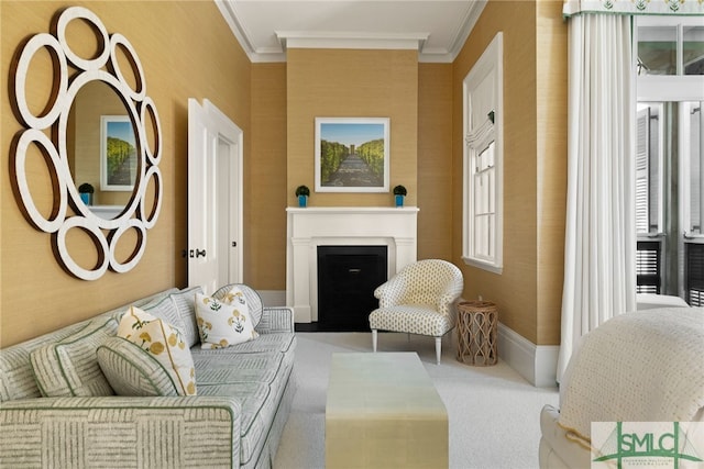 carpeted living room with crown molding, baseboards, and a fireplace with flush hearth