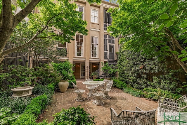 view of patio / terrace with stairway