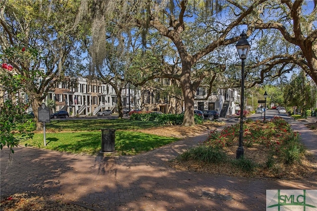 view of community with a lawn