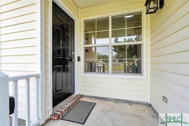 entrance to property with a porch