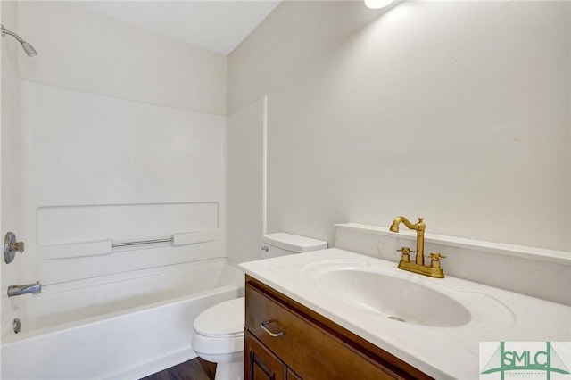 full bathroom featuring toilet, shower / bath combination, and vanity