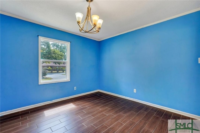 spare room with baseboards, a notable chandelier, and wood tiled floor