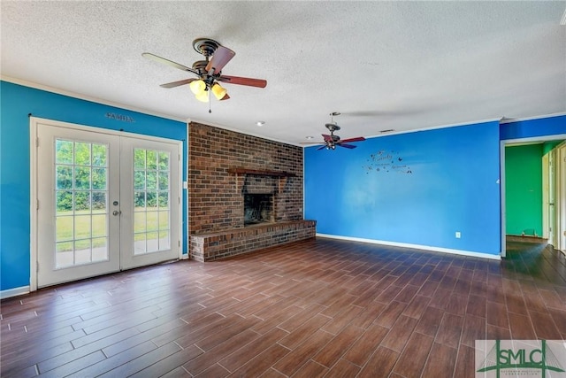 unfurnished living room with a ceiling fan, baseboards, and a textured ceiling