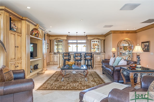 living room featuring wet bar, recessed lighting, crown molding, and visible vents