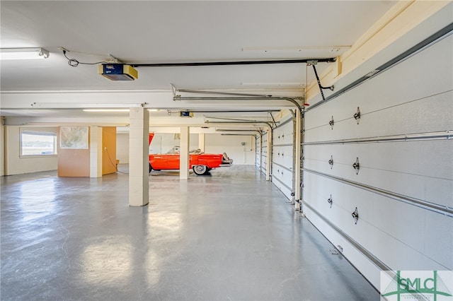 garage featuring a garage door opener