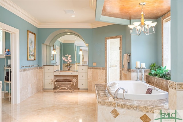 full bathroom with wainscoting, a chandelier, tile walls, and a garden tub