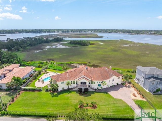 birds eye view of property featuring a water view