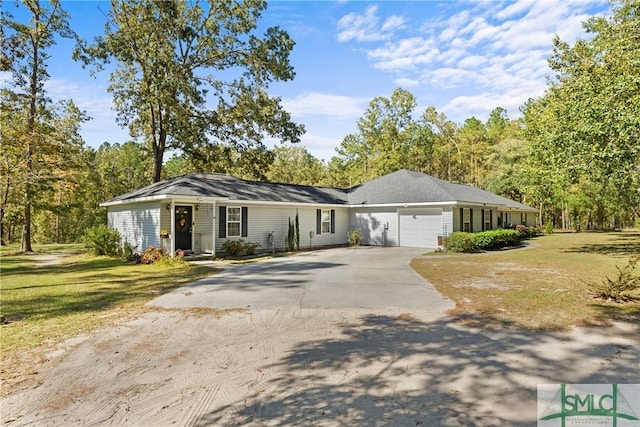 671 M P Martin Rd, Brooklet, GA 30415 - ranch-style house featuring concrete driveway, a front lawn, and a garage