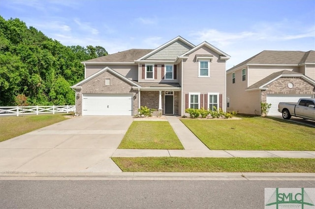 craftsman-style home with an attached garage, fence, a front lawn, concrete driveway, and brick siding