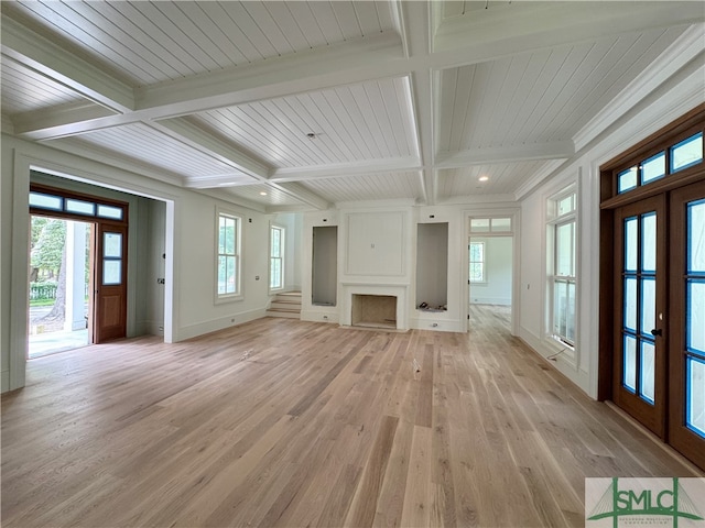 13 Magnolia Ln, Richmond Hill, GA 31324 - unfurnished living room with coffered ceiling, beam ceiling, light wood-type flooring, baseboards, and recessed lighting