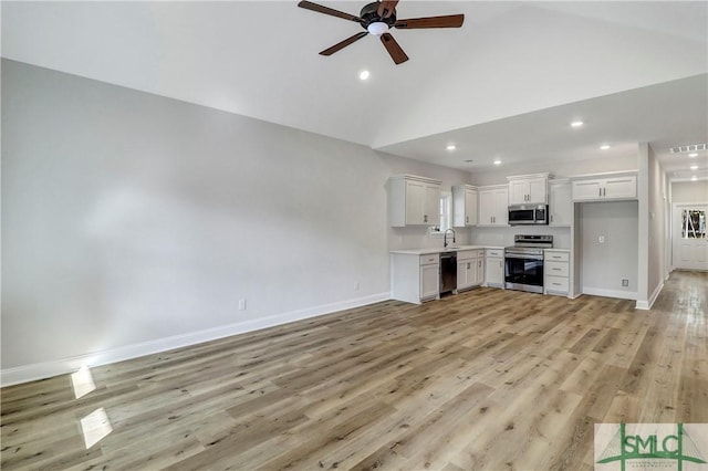 unfurnished living room featuring baseboards, recessed lighting, visible vents, and ceiling fan