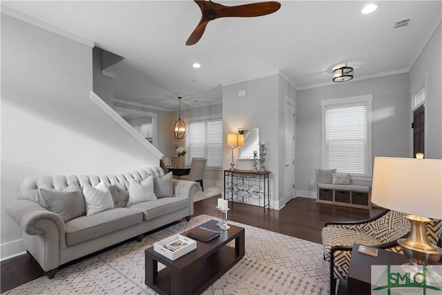 living room featuring recessed lighting, baseboards, ceiling fan, visible vents, and wood finished floors