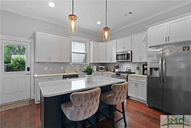 kitchen with a wealth of natural light, stainless steel appliances, and recessed lighting
