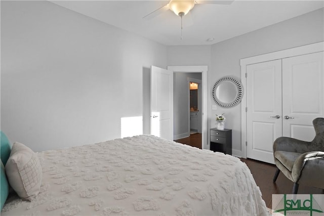 bedroom with a closet, dark wood-type flooring, and a ceiling fan