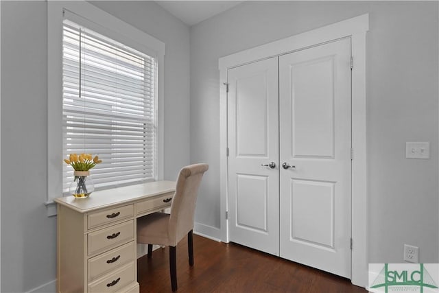 office space featuring dark wood finished floors and baseboards