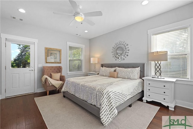 bedroom featuring baseboards, recessed lighting, visible vents, and dark wood-type flooring