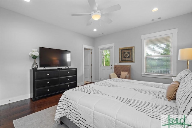 bedroom with wood finished floors, visible vents, baseboards, ceiling fan, and recessed lighting