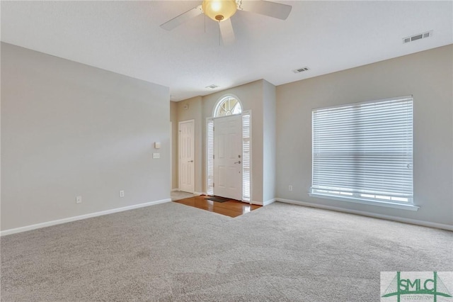 104 Coach House Sq, Pooler, GA 31322 - foyer entrance featuring ceiling fan, carpet flooring, baseboards, and visible vents